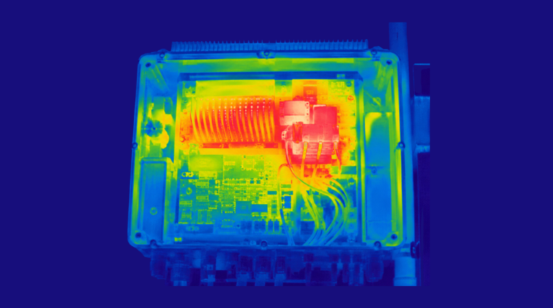 Thermal imaging of a solar inverter showing heat concentration around internal components