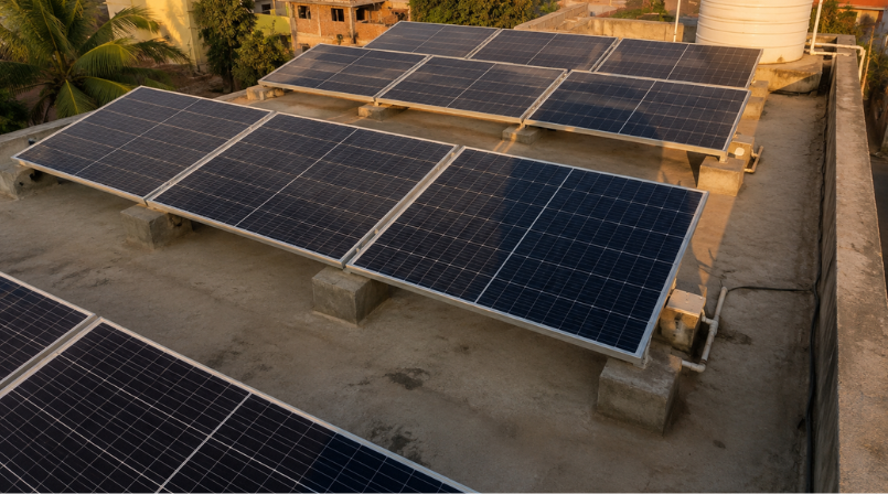 Shadow from a rooftop water tank falling across solar panels